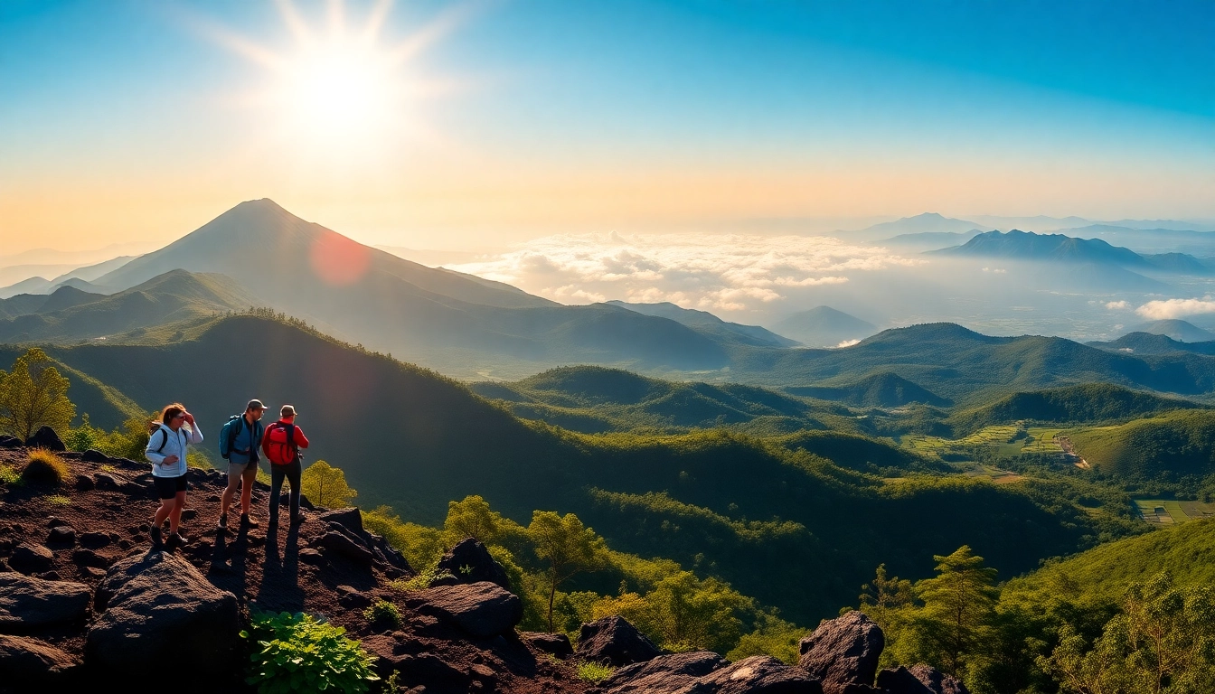Hikers overlooking Lombok's Rinjani Volcano at sunrise from the crater rim